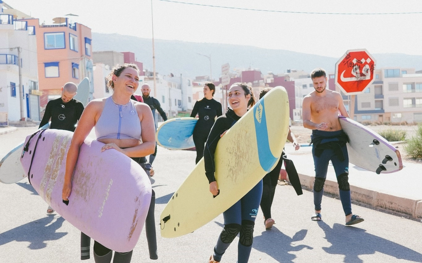 Cactus Surf Experience team with surfboards in Imsouane